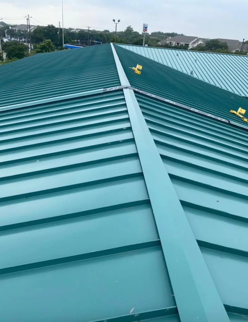 Green commercial metal roof ridge and valley for Metal Roof Repair in Bonita Springs